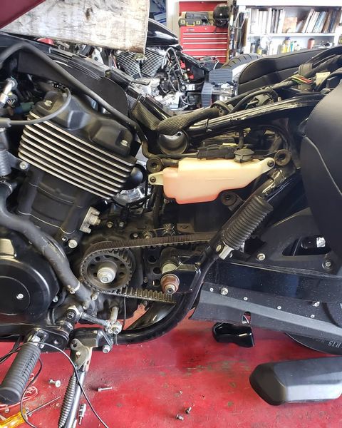 Doing some service work on a street 750
